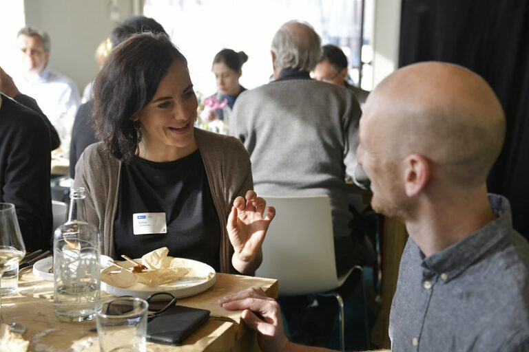 Sue Tobler at a table